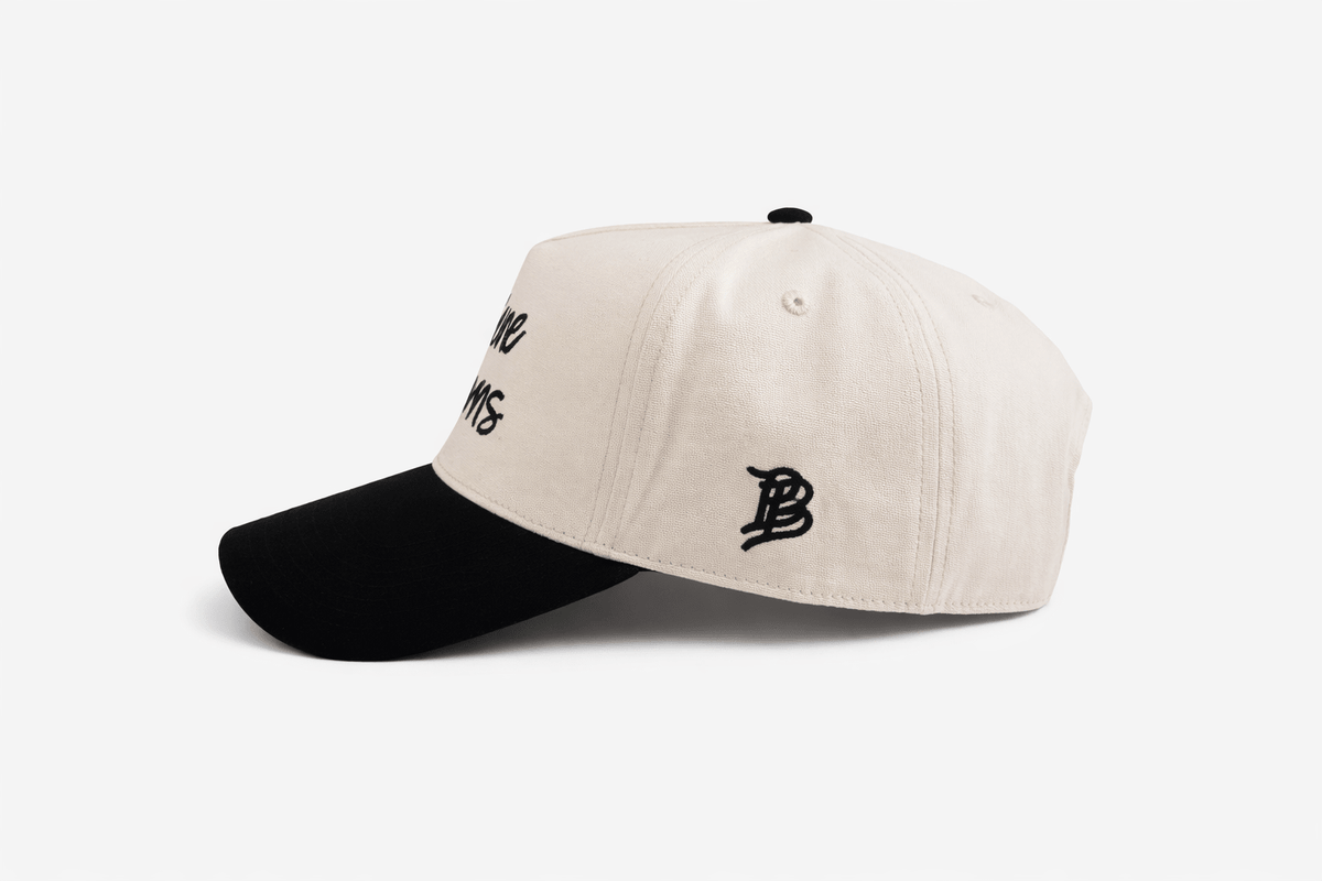a white and black baseball cap