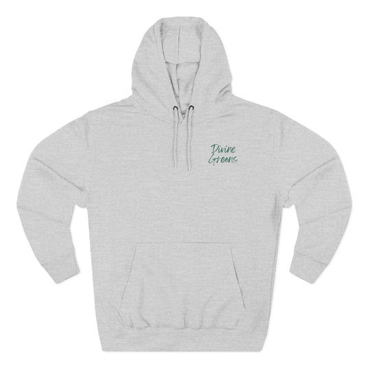 a grey sweatshirt with green writing